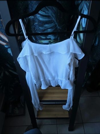 Haut épaules dénudées et manches longues 