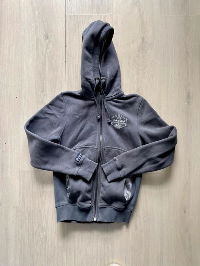 Sweat 64 taille 12 ans. Tbe