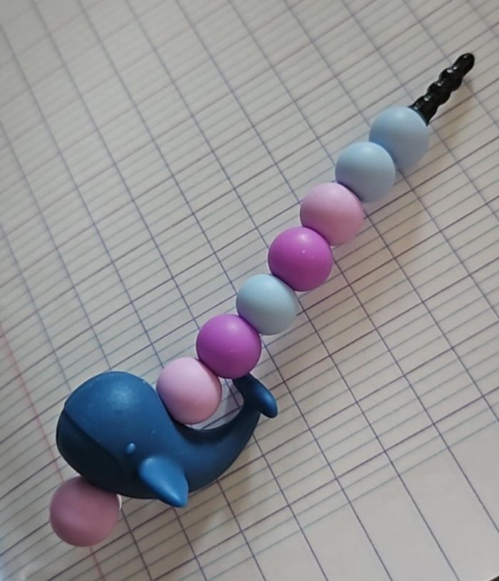 Cache poussière baleine