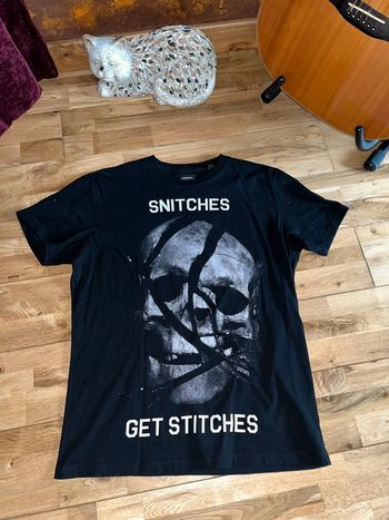 T-shirt diesel noir à motif très bon état S