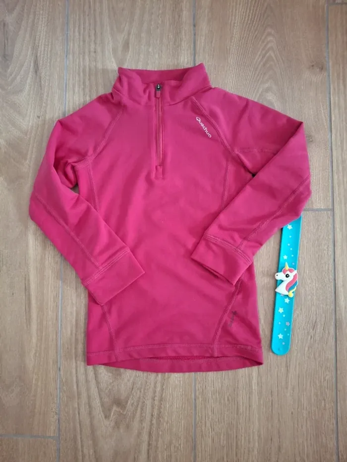 Pull zippé Quechua 6 ans très bon état