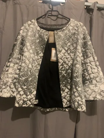 veste neuve à paillettes