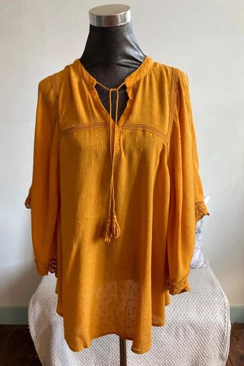 Blouse manches chauve-souris.