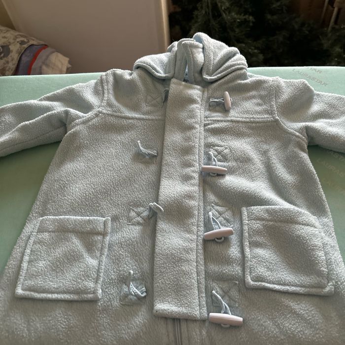 Vends combinaison pilote chaude avec capuche 12 mois