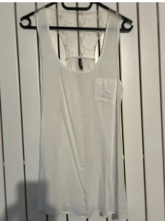 Joli débardeur  Naf Naf taille 36 en parfait état