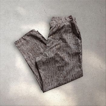 Pantalon taille élastique jambes larges motifs python taille M