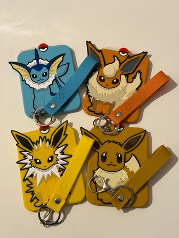 Pokémon - Lot de 4 porte-cartes Evoli