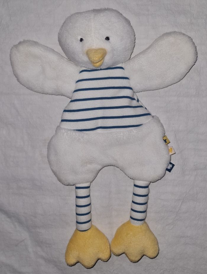 Doudou plat canard grelot blanc et bleu rayé- pouet pouet - Tape à l'œil