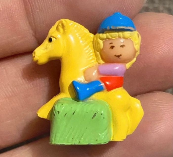 Figurine On her pony ring