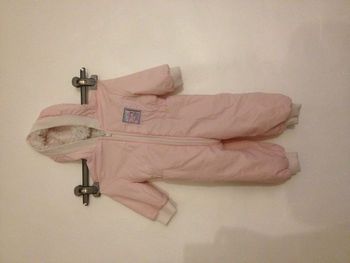 Combi-pilote bébé rose fourrée à capuche 