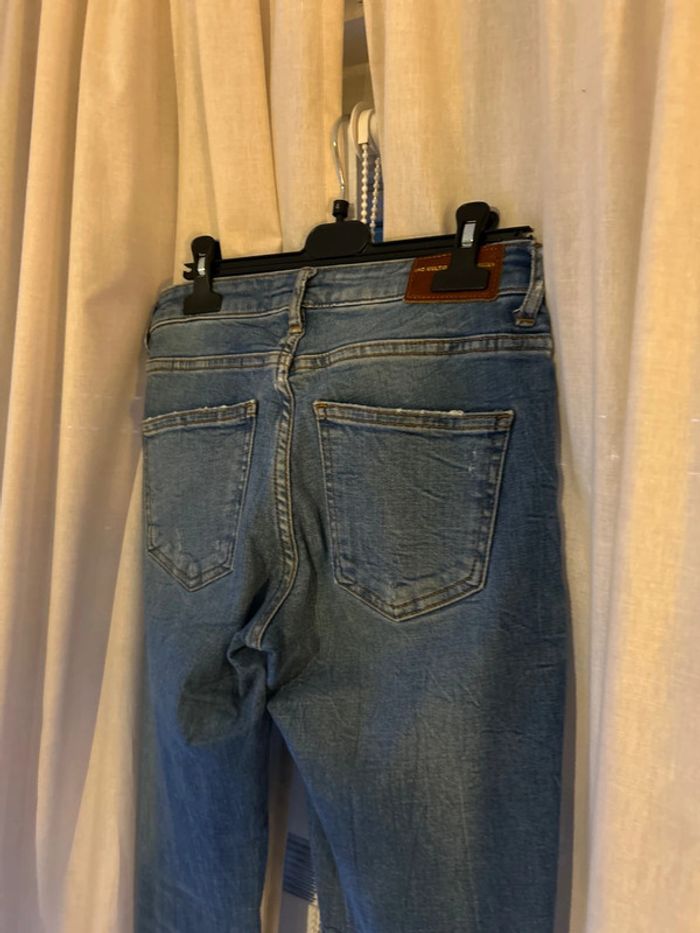 Jeans trouée - photo numéro 5