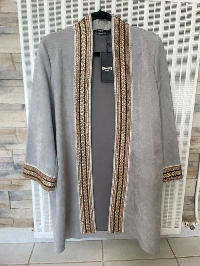 Veste effet peau de pêche, neuve