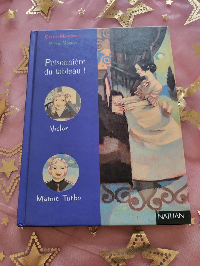 Un livre titre : prisonnière du tableau !