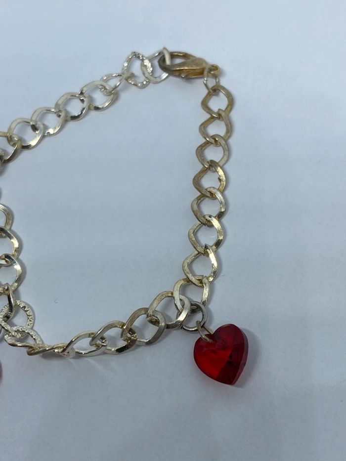 Bracelet fantaisie avec 3 coeurs rouge - photo numéro 3