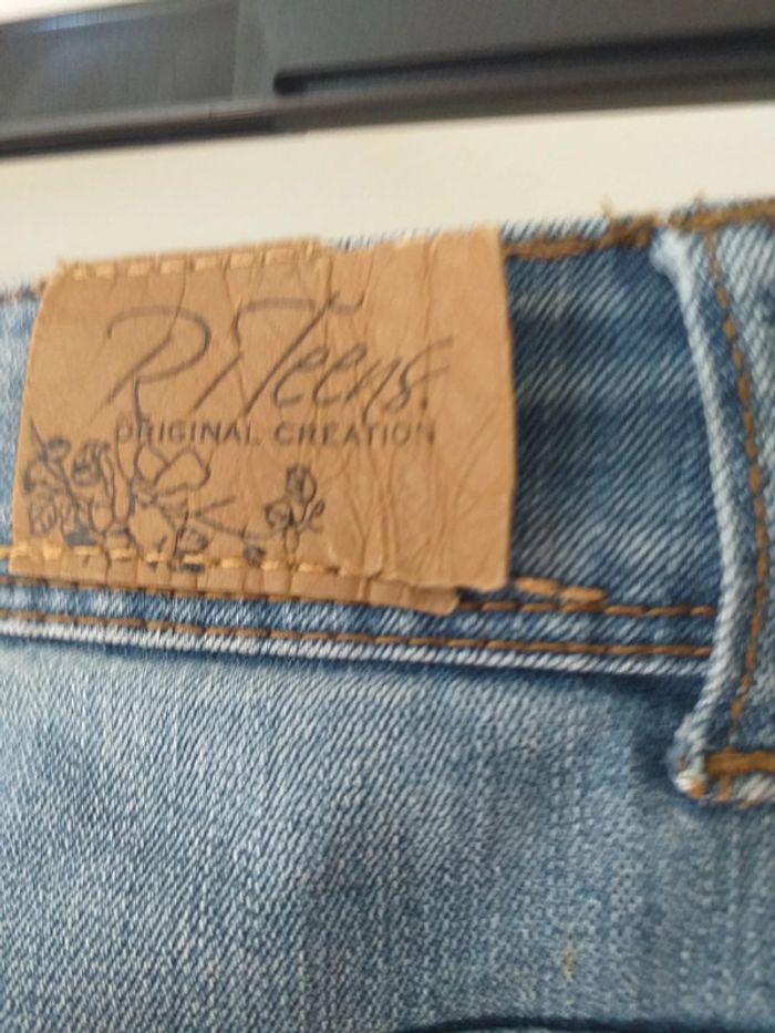 Jeans bleu effet troué - photo numéro 5
