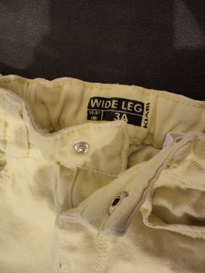 Jeans large jaune pâle 3 ans