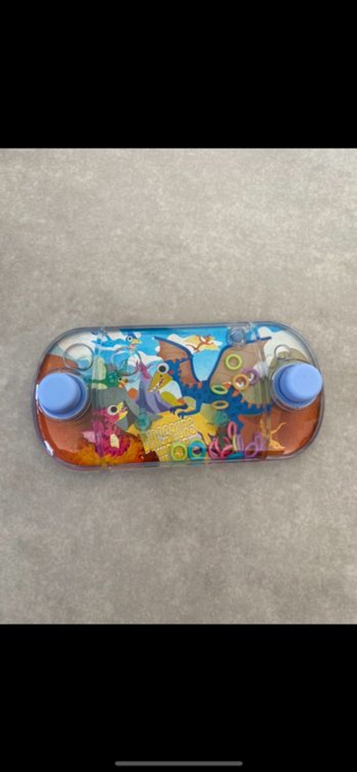 Jeu des anneaux dinosaure neuf