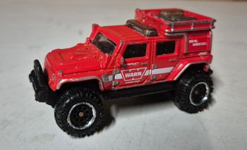 Voiture miniature Matchbox jeep wrangler superlift rouge