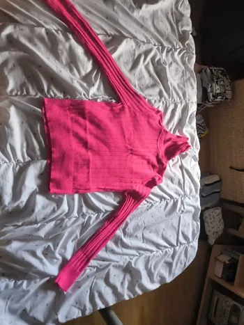 Pull à col roulé rose
