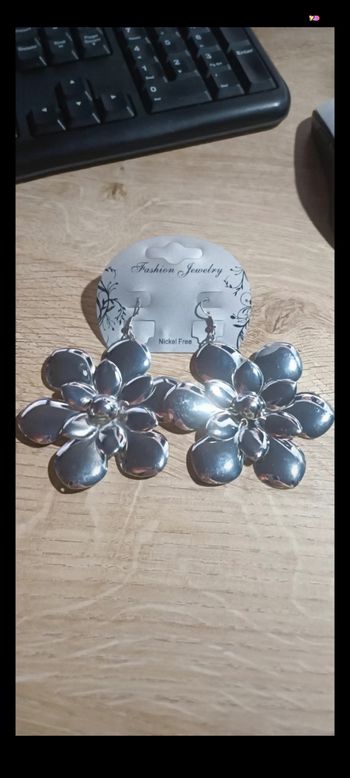 Boucle d'oreille fleur