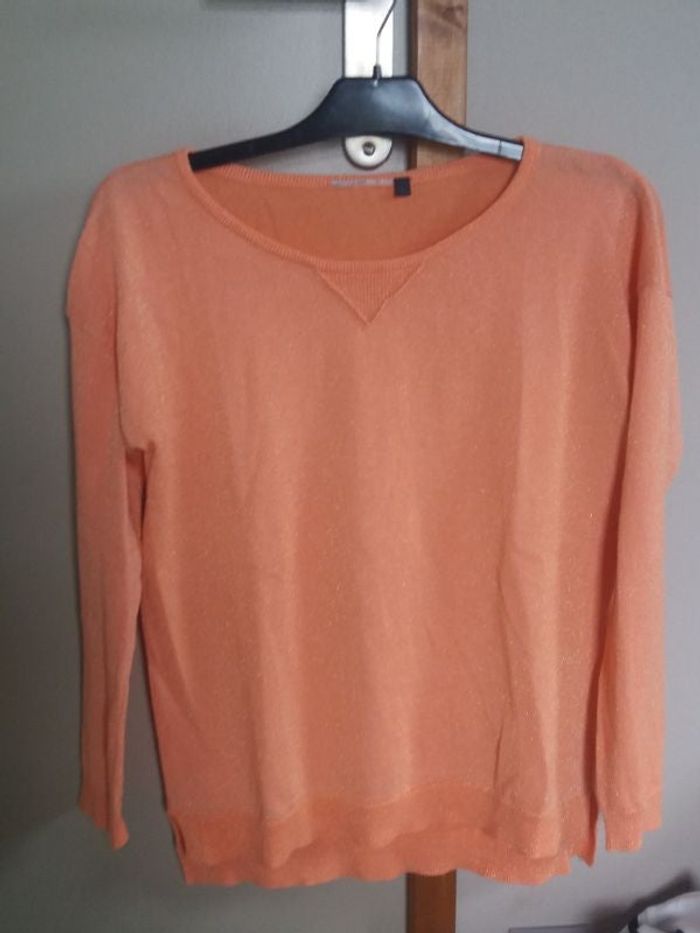Pull orange à paillettes