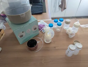 Tire lait portable + stérilisateur micro onde + don contenants