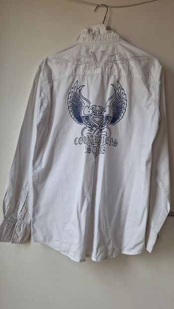 Chemise  blanche avec motif .
