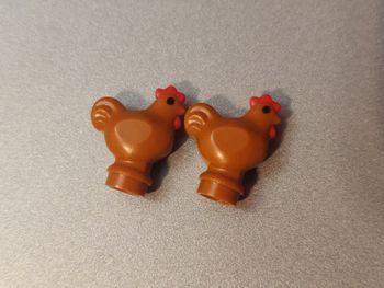 2 poules Lego - en parfait état jamais utilisées - vrai Lego