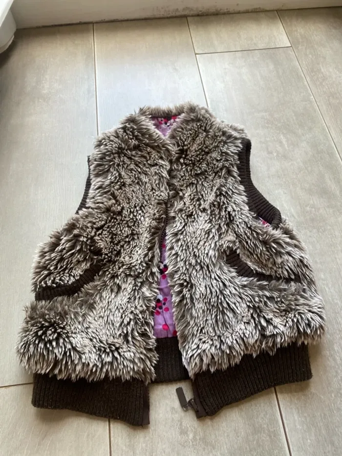 Veste sans manches taille quatre ans