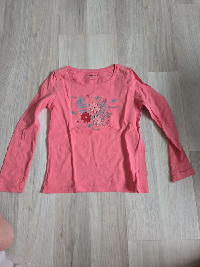Polo rose fleur manches longue 5 ans kiabi