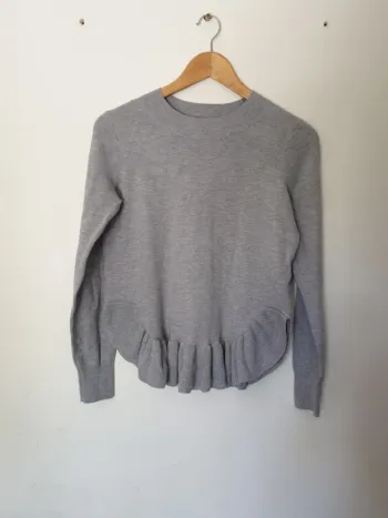 Pull col montant  bas peplum A1179