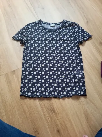 Top resille noir à fleurs blanches et jaunes XS