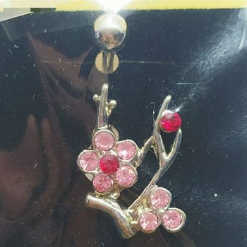 Piercing nombril neuf sous emballage acier chirurgical et strass