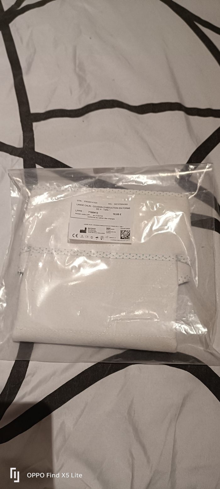Lange câlin ou coussin d'abduction