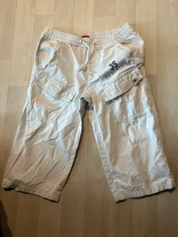 Magnifique short blanc esprit 8 ans avec poches très bon état