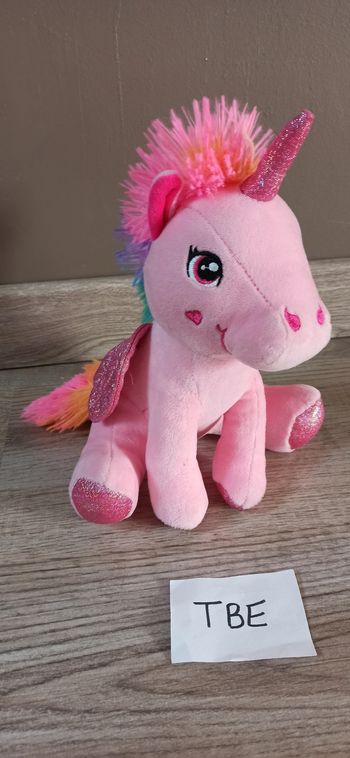 Jolie peluche Licorne multicolore