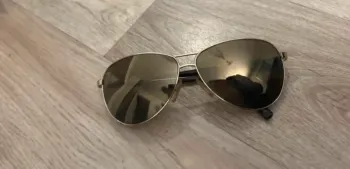 Fendi lunette de soleil doré FS 5194 Branche imprimé logo