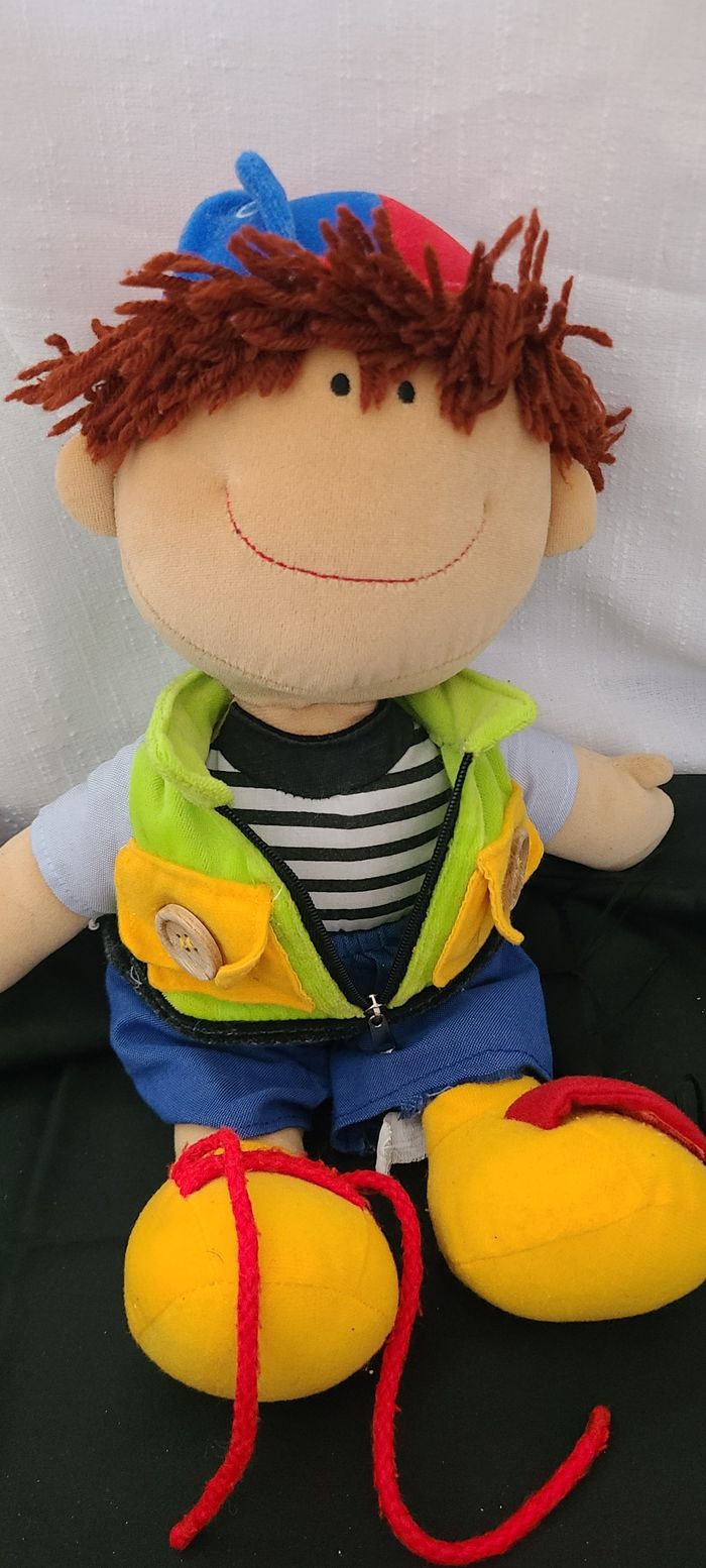 Poupée de chiffon pour promouvoir la motricité des enfants