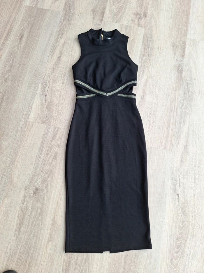 Robe noire longue ouverture aux hanches
