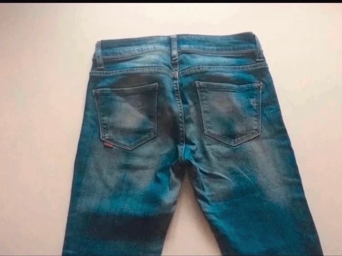 Jean pour femme TRÈS BON ÉTAT taille 38 / M couleur bleu - photo numéro 5