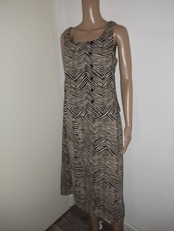 Ensemble affinités Armand Thiery
Jupe taille 44
Haut taille 3