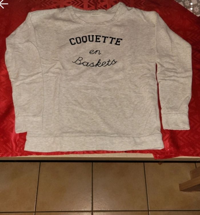 Pull Cache cache - photo numéro 2