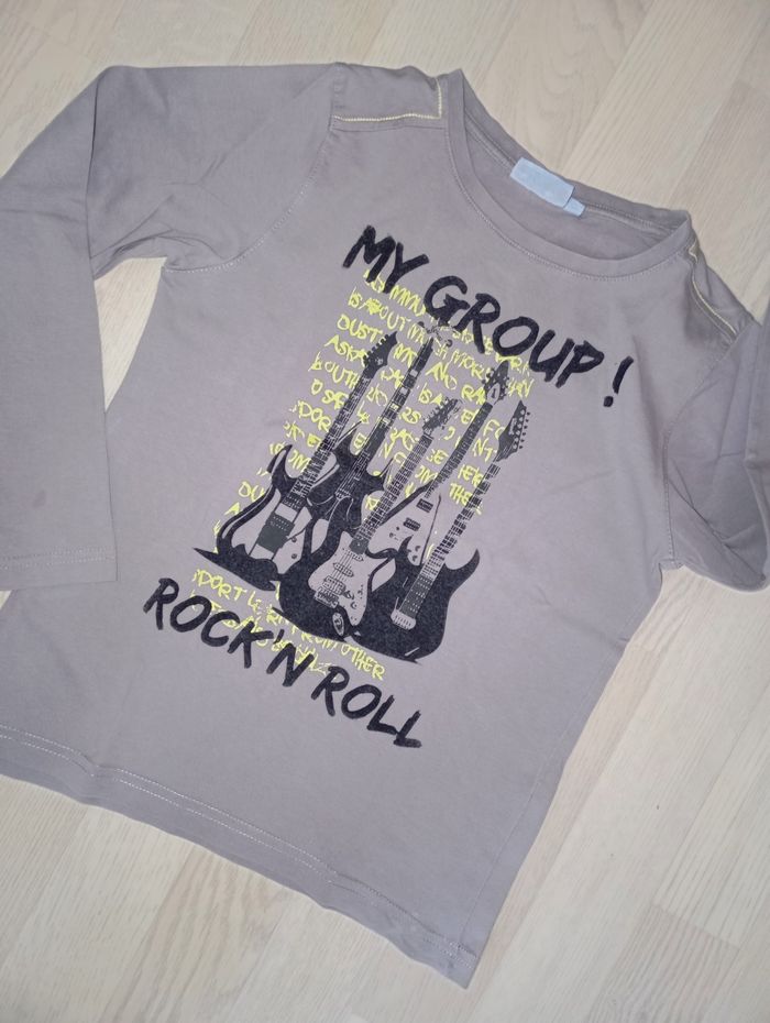 Tee-shirt gris motif guitare rock'n'roll NKY
T. 10 ans - photo numéro 2