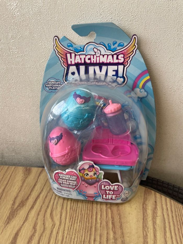 Hatchimals 2 figurines + chaise haute.