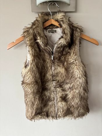 Gilet sans manche à fourrure