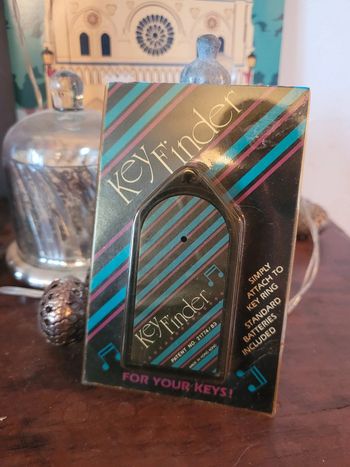 Vends key finder vintage sous blister