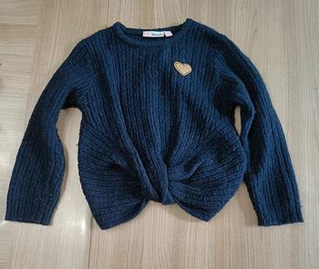 Pull court sur le devant