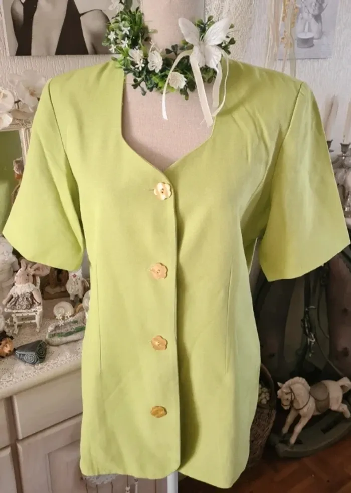 Blaser Veste verte Promod Taille 42
Fermeture boutonnée
Doublée - photo numéro 2