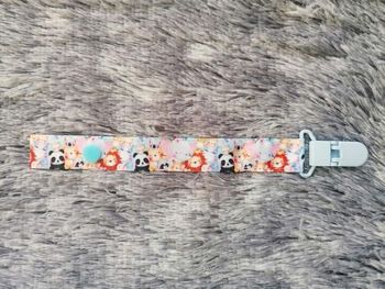 Attache tétine animaux