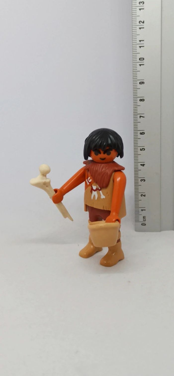 Homme de cromagnon avec bol et os playmobil